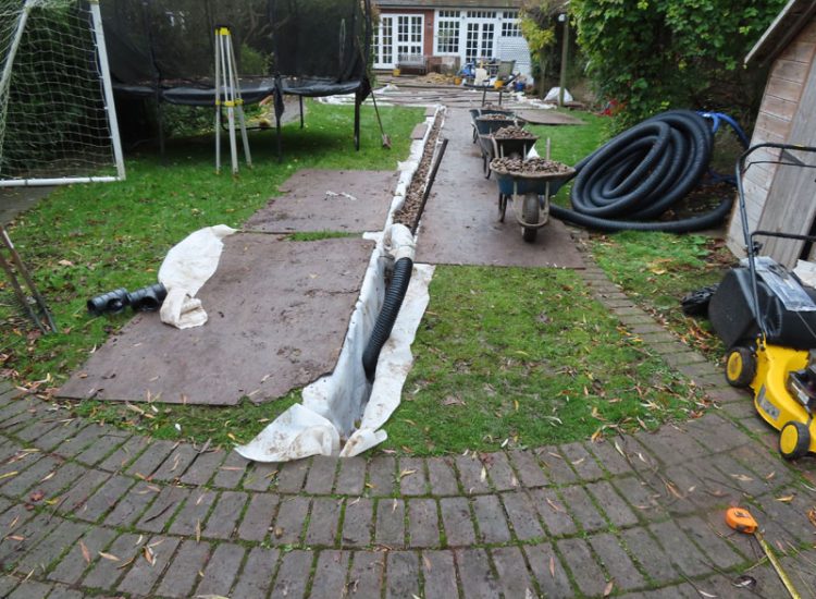 Lawn and Garden Drainage East Finchley, London, N2 - Runoff from allotments causing persistent issues creating unmanagable lawn areas and preventing installation of a garden building. Lawn and Garden Drainage East Finchley, London, N2 - Runoff from allotments causing persistent issues creating unmanagable lawn areas and preventing installation of a garden building.