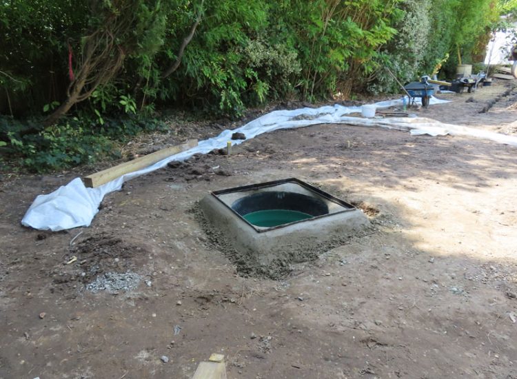 Garden and Lawn Drainage Esher, Surrey, KT10 - A previously installed drainage system which had failed to prevent flooding of lower lawn areas. Garden and Lawn Drainage Esher, Surrey, KT10 - A previously installed drainage system which had failed to prevent flooding of lower lawn areas.