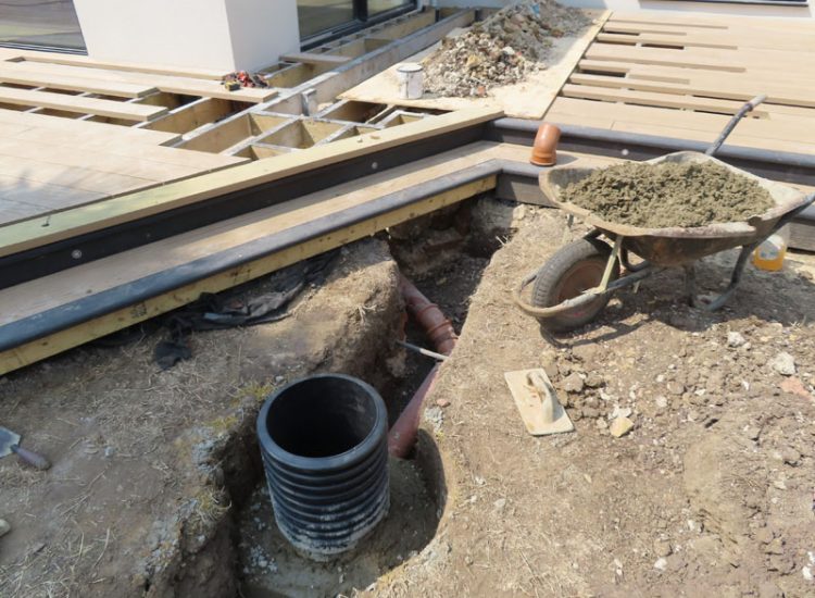 Garden and Lawn Drainage Esher, Surrey, KT10 - A previously installed drainage system which had failed to prevent flooding of lower lawn areas. Garden and Lawn Drainage Esher, Surrey, KT10 - A previously installed drainage system which had failed to prevent flooding of lower lawn areas.