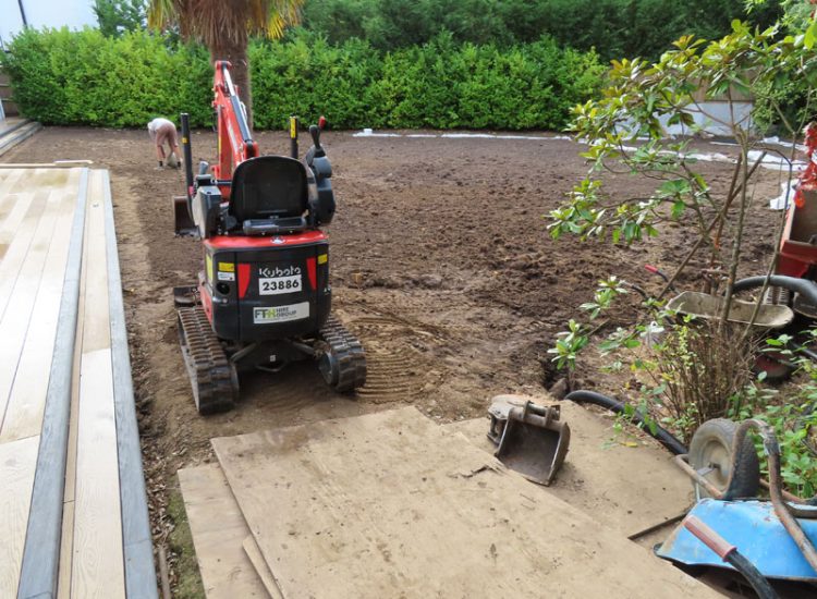 Garden and Lawn Drainage Esher, Surrey, KT10 - A previously installed drainage system which had failed to prevent flooding of lower lawn areas. Garden and Lawn Drainage Esher, Surrey, KT10 - A previously installed drainage system which had failed to prevent flooding of lower lawn areas.