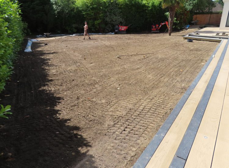 Garden and Lawn Drainage Esher, Surrey, KT10 - A previously installed drainage system which had failed to prevent flooding of lower lawn areas. Garden and Lawn Drainage Esher, Surrey, KT10 - A previously installed drainage system which had failed to prevent flooding of lower lawn areas.