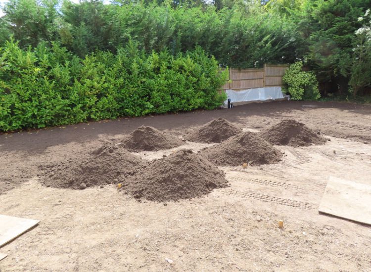 Garden and Lawn Drainage Esher, Surrey, KT10 - A previously installed drainage system which had failed to prevent flooding of lower lawn areas. Garden and Lawn Drainage Esher, Surrey, KT10 - A previously installed drainage system which had failed to prevent flooding of lower lawn areas.