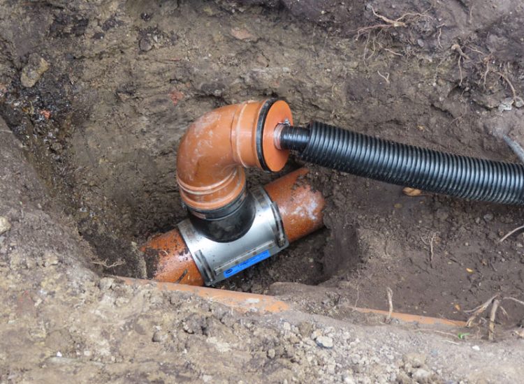 Garden and Lawn Drainage Esher, Surrey, KT10 - A previously installed drainage system which had failed to prevent flooding of lower lawn areas. Garden and Lawn Drainage Esher, Surrey, KT10 - A previously installed drainage system which had failed to prevent flooding of lower lawn areas.