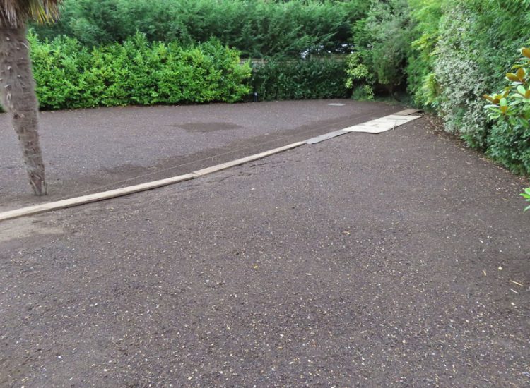 Garden and Lawn Drainage Esher, Surrey, KT10 - A previously installed drainage system which had failed to prevent flooding of lower lawn areas. Garden and Lawn Drainage Esher, Surrey, KT10 - A previously installed drainage system which had failed to prevent flooding of lower lawn areas.