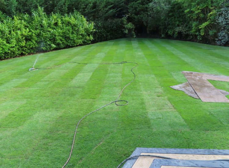 Garden and Lawn Drainage Esher, Surrey, KT10 - A previously installed drainage system which had failed to prevent flooding of lower lawn areas.