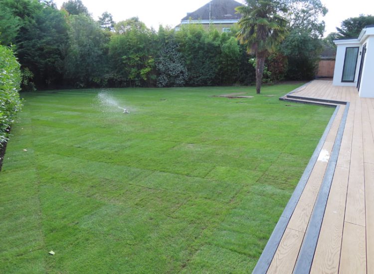 Garden and Lawn Drainage Esher, Surrey, KT10 - A previously installed drainage system which had failed to prevent flooding of lower lawn areas.