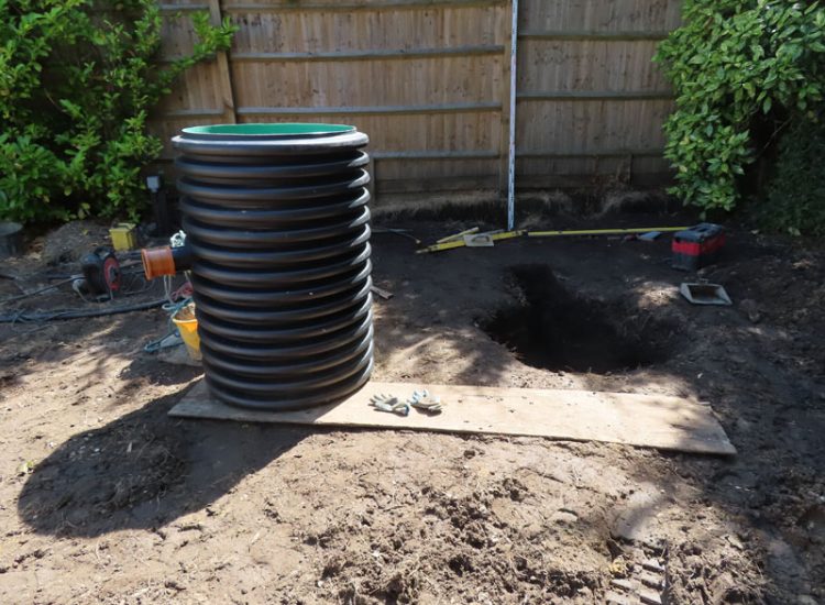 Garden and Lawn Drainage Esher, Surrey, KT10 - A previously installed drainage system which had failed to prevent flooding of lower lawn areas. Garden and Lawn Drainage Esher, Surrey, KT10 - A previously installed drainage system which had failed to prevent flooding of lower lawn areas.