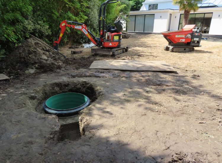 Garden and Lawn Drainage Esher, Surrey, KT10 - A previously installed drainage system which had failed to prevent flooding of lower lawn areas. Garden and Lawn Drainage Esher, Surrey, KT10 - A previously installed drainage system which had failed to prevent flooding of lower lawn areas.