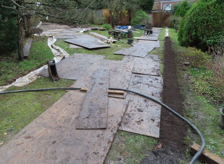 Garden and Lawn Drainage Guildford, Surrey, GU1 - Ingress from neighbouring higher ground caused by tree removal and alterations to levels, leading to flooding around the house. Garden and Lawn Drainage Guildford, Surrey, GU1 - Ingress from neighbouring higher ground caused by tree removal and alterations to levels, leading to flooding around the house.