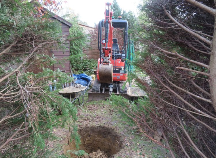 Garden and Lawn Drainage Guildford, Surrey, GU1 - Ingress from neighbouring higher ground caused by tree removal and alterations to levels, leading to flooding around the house. Garden and Lawn Drainage Guildford, Surrey, GU1 - Ingress from neighbouring higher ground caused by tree removal and alterations to levels, leading to flooding around the house.