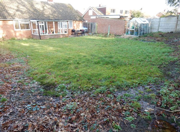 Garden and Lawn Drainage Liss, Hampshire, GU33 - A moderately sized rear garden backing onto and near a pond with its surround set higher than the rear garden. Garden and Lawn Drainage Liss, Hampshire, GU33 - A moderately sized rear garden backing onto and near a pond with its surround set higher than the rear garden.