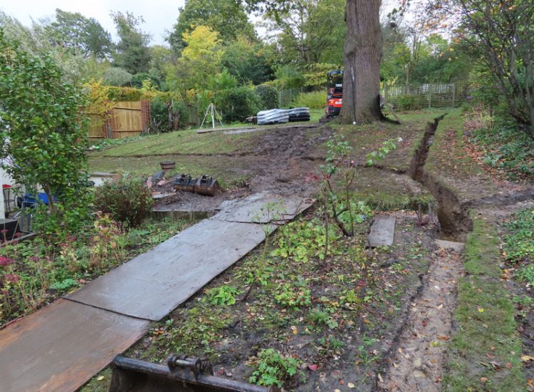 Garden and Lawn Drainage Wimbledon, London, SW19 - Increasing ingress from neighbouring higher ground at the top of this garden causing major issues over border and lawn areas through out the garden. Garden and Lawn Drainage Wimbledon, London, SW19 - Increasing ingress from neighbouring higher ground at the top of this garden causing major issues over border and lawn areas through out the garden.