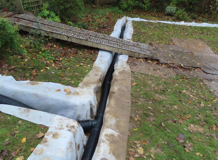 Garden and Lawn Drainage Wimbledon, London, SW19 - Increasing ingress from neighbouring higher ground at the top of this garden causing major issues over border and lawn areas through out the garden. Garden and Lawn Drainage Wimbledon, London, SW19 - Increasing ingress from neighbouring higher ground at the top of this garden causing major issues over border and lawn areas through out the garden.