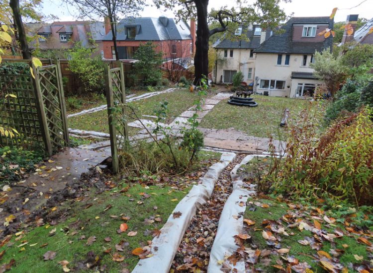 Garden and Lawn Drainage Wimbledon, London, SW19 - Increasing ingress from neighbouring higher ground at the top of this garden causing major issues over border and lawn areas through out the garden. Garden and Lawn Drainage Wimbledon, London, SW19 - Increasing ingress from neighbouring higher ground at the top of this garden causing major issues over border and lawn areas through out the garden.