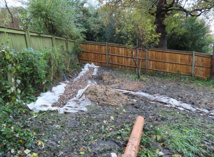Garden and Lawn Drainage Wimbledon, London, SW19 - Increasing ingress from neighbouring higher ground at the top of this garden causing major issues over border and lawn areas through out the garden. Garden and Lawn Drainage Wimbledon, London, SW19 - Increasing ingress from neighbouring higher ground at the top of this garden causing major issues over border and lawn areas through out the garden.