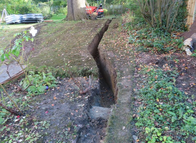 Garden and Lawn Drainage Wimbledon, London, SW19 - Increasing ingress from neighbouring higher ground at the top of this garden causing major issues over border and lawn areas through out the garden. Garden and Lawn Drainage Wimbledon, London, SW19 - Increasing ingress from neighbouring higher ground at the top of this garden causing major issues over border and lawn areas through out the garden.