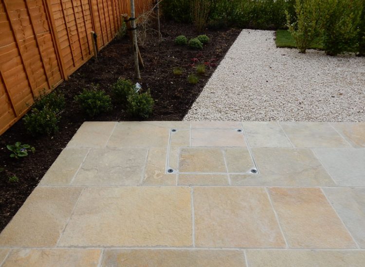 Garden Paving Bramley, Tadley, Hampshire, RG26 - Kota yellow limestone paving to form a terrace area and pathway. Garden Paving Bramley, Tadley, Hampshire, RG26 - Kota yellow limestone paving to form a terrace area and pathway.