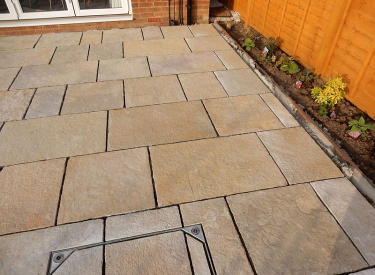 Garden Paving Bramley, Tadley, Hampshire, RG26 - Kota yellow limestone paving to form a terrace area and pathway. Garden Paving Bramley, Tadley, Hampshire, RG26 - Kota yellow limestone paving to form a terrace area and pathway.