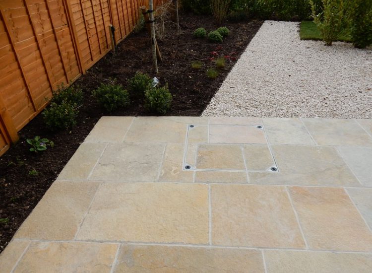 Garden Paving Bramley, Tadley, Hampshire, RG26 - Kota yellow limestone paving to form a terrace area and pathway. Garden Paving Bramley, Tadley, Hampshire, RG26 - Kota yellow limestone paving to form a terrace area and pathway.