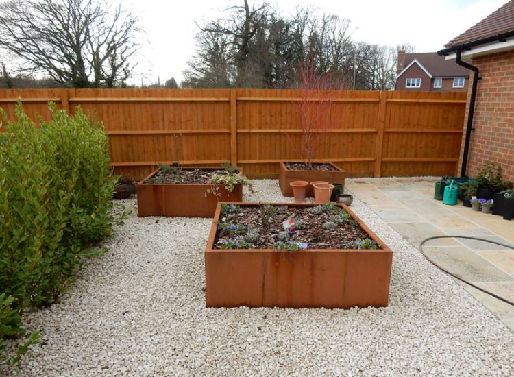 Garden Paving Bramley, Tadley, Hampshire, RG26 - Kota yellow limestone paving to form a terrace area and pathway.