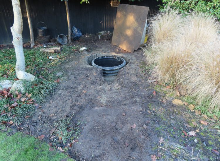 Lawn Drainage Cobham, Surrey, KT11 - With a clay based soil medium, this clients lawn was getting more and more difficult to manage and maintain, along with problems related to a small pond area. Lawn Drainage Cobham, Surrey, KT11 - With a clay based soil medium, this clients lawn was getting more and more difficult to manage and maintain, along with problems related to a small pond area.