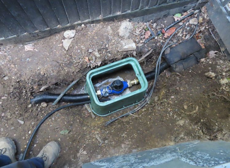 Lawn Drainage Cobham, Surrey, KT11 - With a clay based soil medium, this clients lawn was getting more and more difficult to manage and maintain, along with problems related to a small pond area.