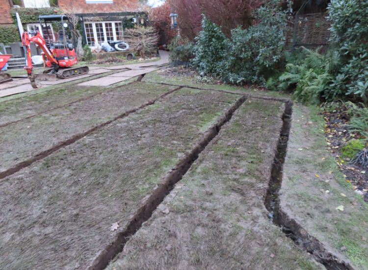 Lawn Drainage Cobham, Surrey, KT11 - With a clay based soil medium, this clients lawn was getting more and more difficult to manage and maintain, along with problems related to a small pond area. Lawn Drainage Cobham, Surrey, KT11 - With a clay based soil medium, this clients lawn was getting more and more difficult to manage and maintain, along with problems related to a small pond area.
