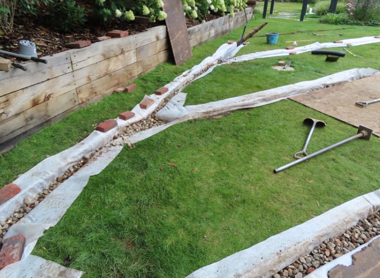 Lawn Drainage Hersham, Walton-on-Thames, Surrey, KT12 - A recently completed landscaped garden with drainage issues. Lawn Drainage Hersham, Walton-on-Thames, Surrey, KT12 - A recently completed landscaped garden with drainage issues.