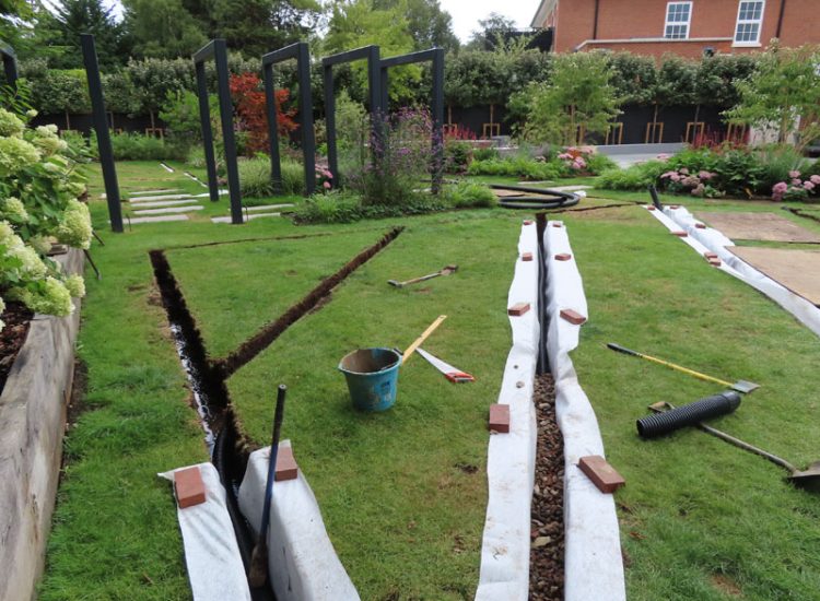 Lawn Drainage Hersham, Walton-on-Thames, Surrey, KT12 - A recently completed landscaped garden with drainage issues. Lawn Drainage Hersham, Walton-on-Thames, Surrey, KT12 - A recently completed landscaped garden with drainage issues.