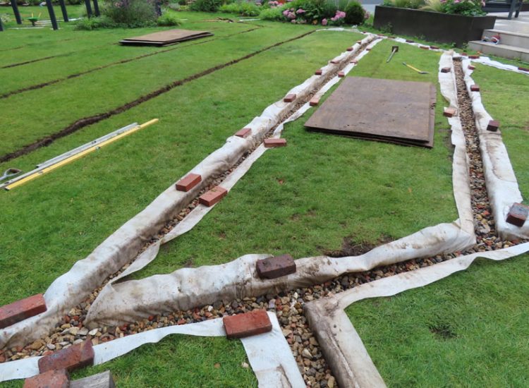 Lawn Drainage Hersham, Walton-on-Thames, Surrey, KT12 - A recently completed landscaped garden with drainage issues. Lawn Drainage Hersham, Walton-on-Thames, Surrey, KT12 - A recently completed landscaped garden with drainage issues.