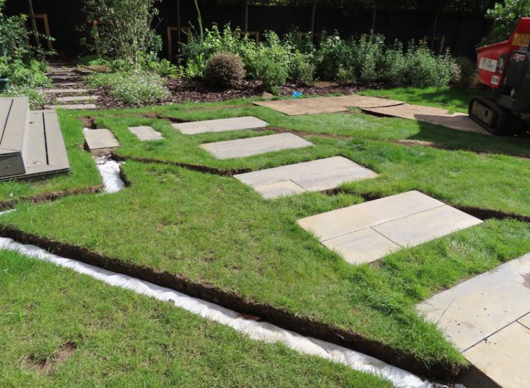 Lawn Drainage Hersham, Walton-on-Thames, Surrey, KT12 - A recently completed landscaped garden with drainage issues. Lawn Drainage Hersham, Walton-on-Thames, Surrey, KT12 - A recently completed landscaped garden with drainage issues.