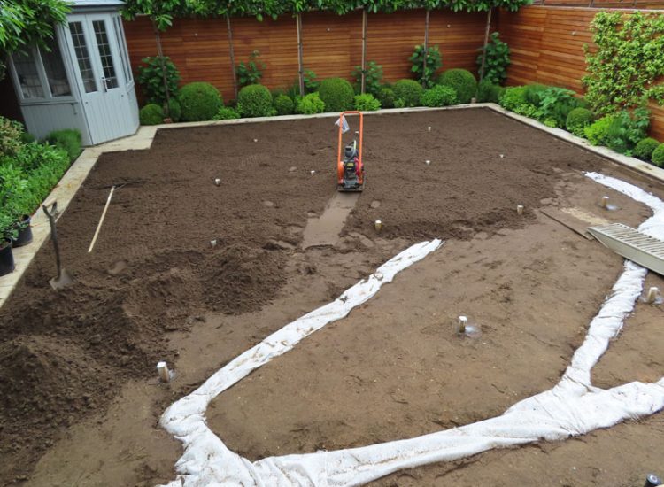 Drainage and New Lawn Weybridge, Surrey, KT13 - A completed garden previosly landscaped but left with lawn drainage issues. Drainage and New Lawn Weybridge, Surrey, KT13 - A completed garden previosly landscaped but left with lawn drainage issues.