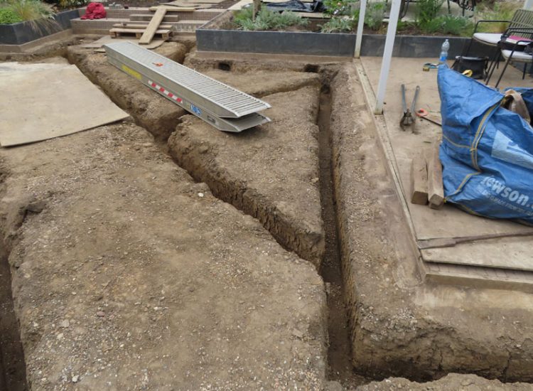 Lawn and Garden Drainage Raynes Park, London, SW20 - Failed drainage solutions needing to be resolved in a recently completed landscaped rear garden. Lawn and Garden Drainage Raynes Park, London, SW20 - Failed drainage solutions needing to be resolved in a recently completed landscaped rear garden.