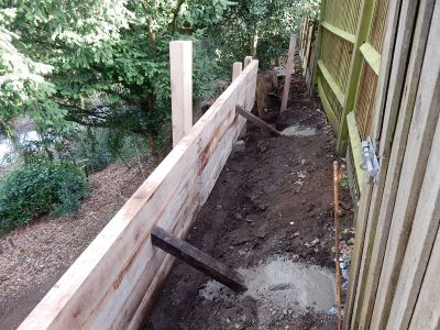 New Oak Sleeper Retaining Walls Farnham, Surrey, GU9 - Extensive oak sleeper retaining walls within an embankment area. New Oak Sleeper Retaining Walls Farnham, Surrey, GU9 - Extensive oak sleeper retaining walls within an embankment area.