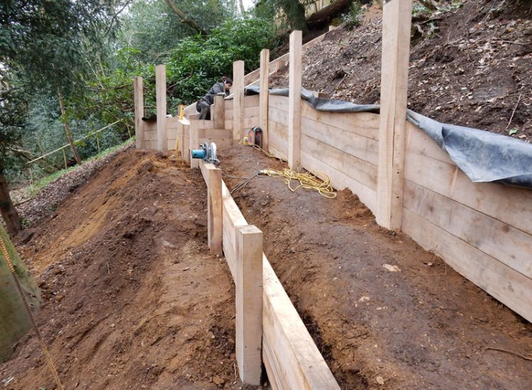 New Oak Sleeper Retaining Walls Farnham, Surrey, GU9 - Extensive oak sleeper retaining walls within an embankment area. New Oak Sleeper Retaining Walls Farnham, Surrey, GU9 - Extensive oak sleeper retaining walls within an embankment area.
