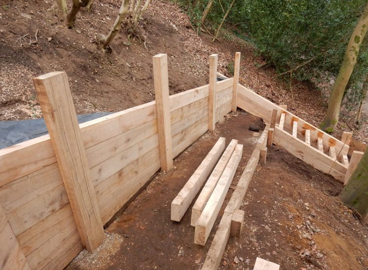 New Oak Sleeper Retaining Walls Farnham, Surrey, GU9 - Extensive oak sleeper retaining walls within an embankment area. New Oak Sleeper Retaining Walls Farnham, Surrey, GU9 - Extensive oak sleeper retaining walls within an embankment area.