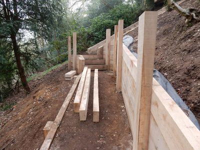 New Oak Sleeper Retaining Walls Farnham, Surrey, GU9 - Extensive oak sleeper retaining walls within an embankment area. New Oak Sleeper Retaining Walls Farnham, Surrey, GU9 - Extensive oak sleeper retaining walls within an embankment area.