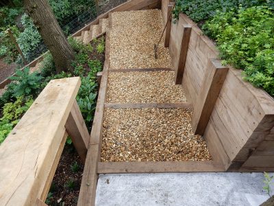 New Oak Sleeper Retaining Walls Farnham, Surrey, GU9 - Extensive oak sleeper retaining walls within an embankment area. New Oak Sleeper Retaining Walls Farnham, Surrey, GU9 - Extensive oak sleeper retaining walls within an embankment area.