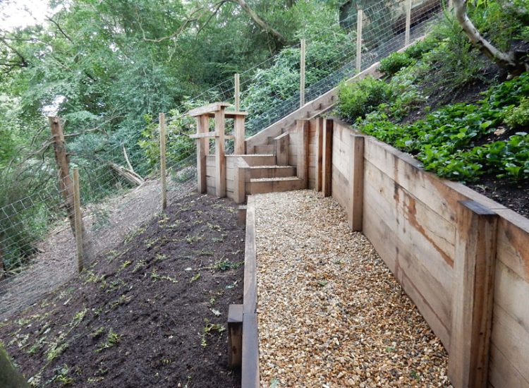 New Oak Sleeper Retaining Walls Farnham, Surrey, GU9 - Extensive oak sleeper retaining walls within an embankment area. New Oak Sleeper Retaining Walls Farnham, Surrey, GU9 - Extensive oak sleeper retaining walls within an embankment area.
