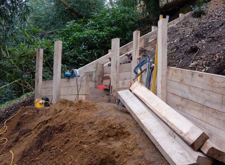 New Oak Sleeper Retaining Walls Farnham, Surrey, GU9 - Extensive oak sleeper retaining walls within an embankment area. New Oak Sleeper Retaining Walls Farnham, Surrey, GU9 - Extensive oak sleeper retaining walls within an embankment area.