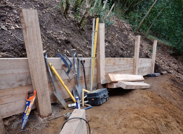 New Oak Sleeper Retaining Walls Farnham, Surrey, GU9 - Extensive oak sleeper retaining walls within an embankment area. New Oak Sleeper Retaining Walls Farnham, Surrey, GU9 - Extensive oak sleeper retaining walls within an embankment area.