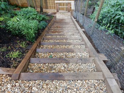 New Oak Sleeper Steps Farnham, Surrey, GU9 - Extensive oak sleeper steps incorporated through an embankment area. New Oak Sleeper Steps Farnham, Surrey, GU9 - Extensive oak sleeper steps incorporated through an embankment area.