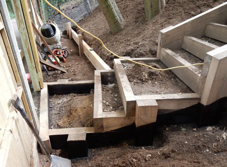 New Oak Sleeper Steps Farnham, Surrey, GU9 - Extensive oak sleeper steps incorporated through an embankment area. New Oak Sleeper Steps Farnham, Surrey, GU9 - Extensive oak sleeper steps incorporated through an embankment area.