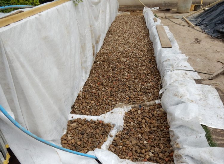 Garden and Planting Border Drainage Cobham, Surrey, KT11 - High retaining walls constructed with no drainage detail behind. Garden and Planting Border Drainage Cobham, Surrey, KT11 - High retaining walls constructed with no drainage detail behind.