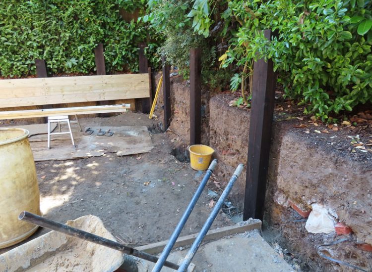 Timber Retaining Walling Claygate, Surrey, KT10 - Repair and replacement of sections of old, dilapidated timber walling. Timber Retaining Walling Claygate, Surrey, KT10 - Repair and replacement of sections of old, dilapidated timber walling.