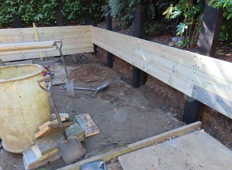 Timber Retaining Walling Claygate, Surrey, KT10 - Repair and replacement of sections of old, dilapidated timber walling. Timber Retaining Walling Claygate, Surrey, KT10 - Repair and replacement of sections of old, dilapidated timber walling.