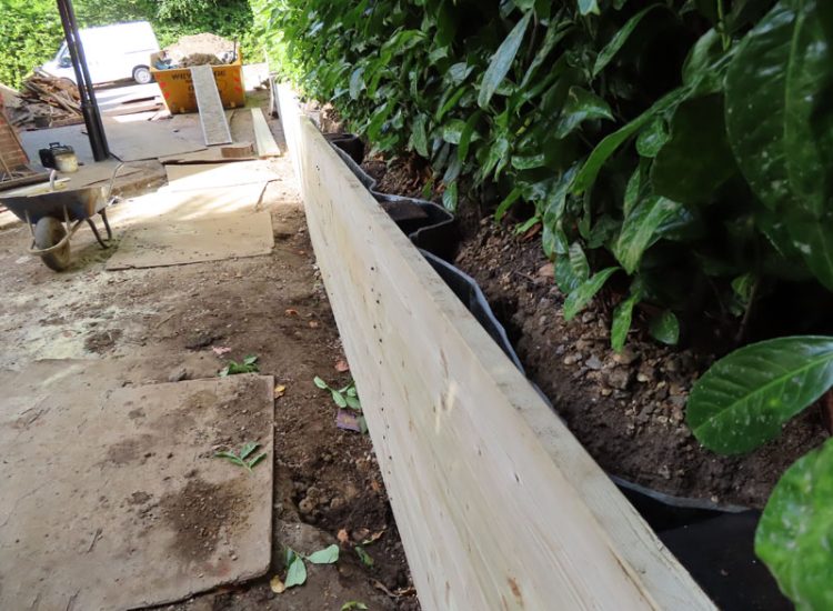Timber Retaining Walling Claygate, Surrey, KT10 - Repair and replacement of sections of old, dilapidated timber walling. Timber Retaining Walling Claygate, Surrey, KT10 - Repair and replacement of sections of old, dilapidated timber walling.