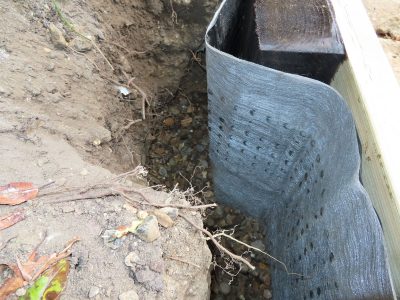 Timber Retaining Walling Claygate, Surrey, KT10 - Repair and replacement of sections of old, dilapidated timber walling. Timber Retaining Walling Claygate, Surrey, KT10 - Repair and replacement of sections of old, dilapidated timber walling.