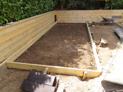 Timber Retaining Walling Claygate, Surrey, KT10 - Repair and replacement of sections of old, dilapidated timber walling. Timber Retaining Walling Claygate, Surrey, KT10 - Repair and replacement of sections of old, dilapidated timber walling.