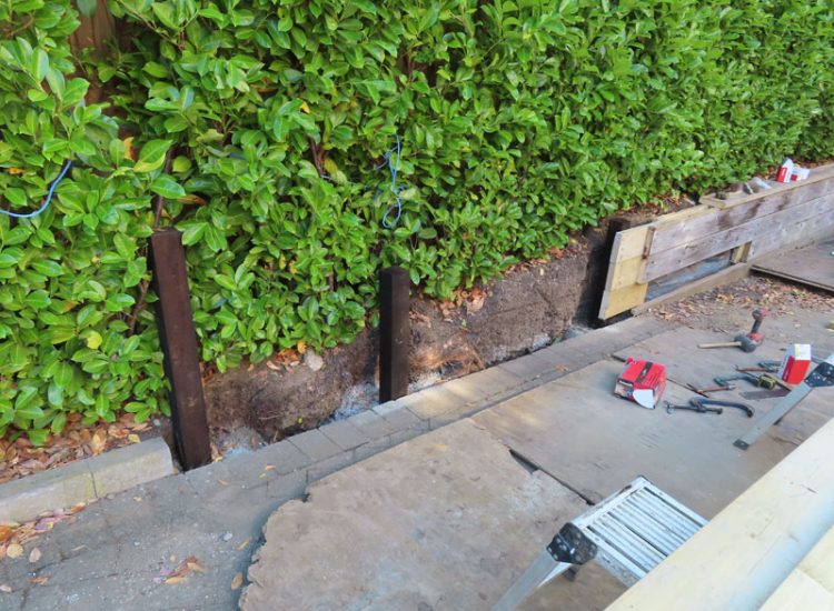 Timber Retaining Walling Claygate, Surrey, KT10 - Repair and replacement of sections of old, dilapidated timber walling. Timber Retaining Walling Claygate, Surrey, KT10 - Repair and replacement of sections of old, dilapidated timber walling.